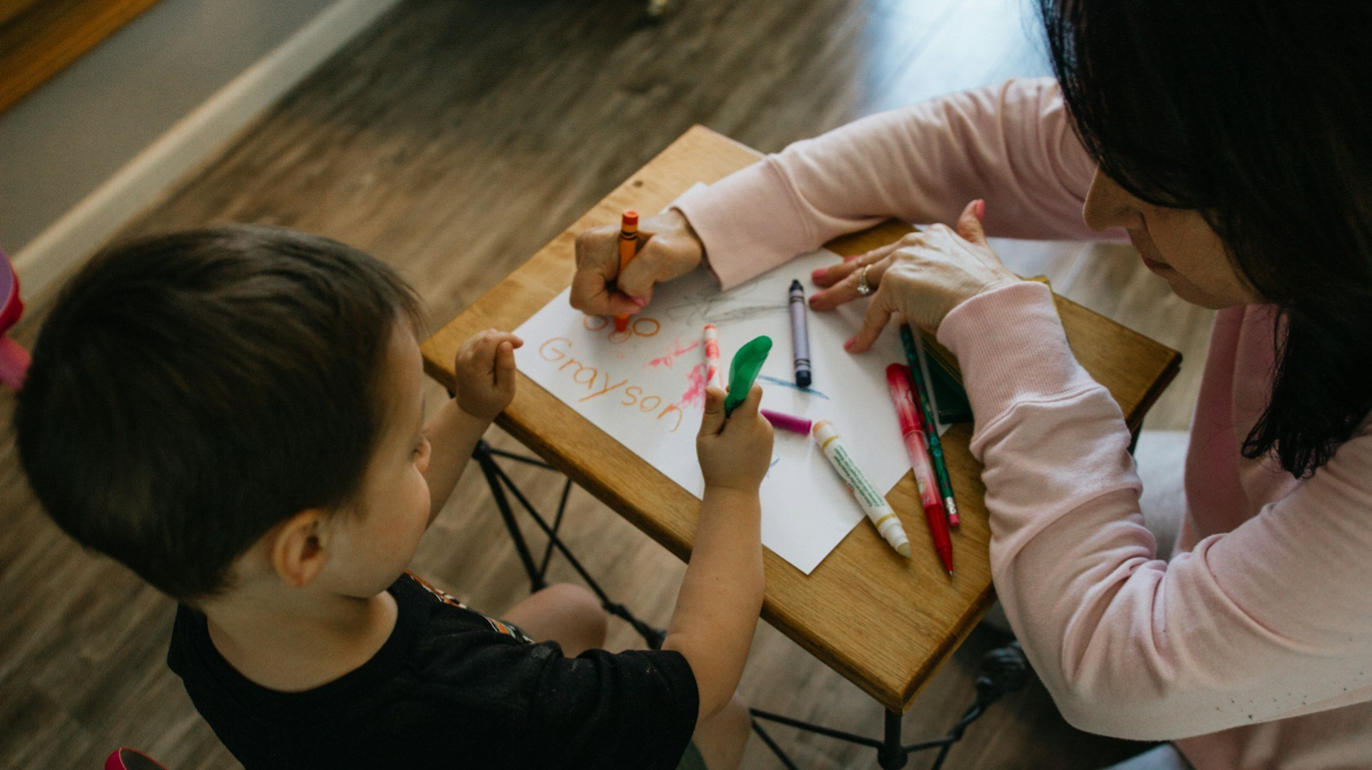 child and mum drawing