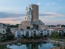 LUMA museum against evening sky