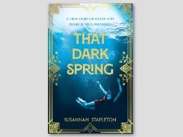 book cover for That Dark Spring: woman underwater with gold trim on edges