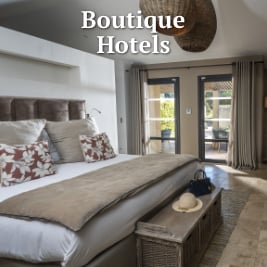 well appointed bedroom with large bed in luxury hotel