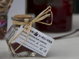one gram of saffron in a small glass jar with a price tag of over €12