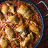 cast iron pan containing paella