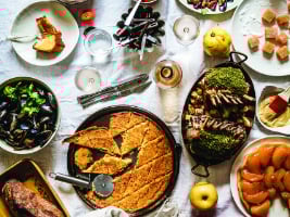 a table covered with plates of food specific to Nice, France