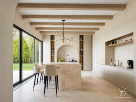 minimalist kitchen and dining area in neutral colours with large window