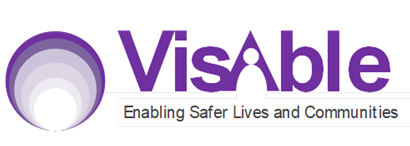 A logo featuring a circular gradient design made of layered arcs in shades of purple that become lighter toward the center. To the right is the word ‘VisAble’ in bold purple lettering, with the letter ‘A’ stylized as a person with outstretched arms. Beneath the name is the tagline ‘Enabling Safer Lives and Communities