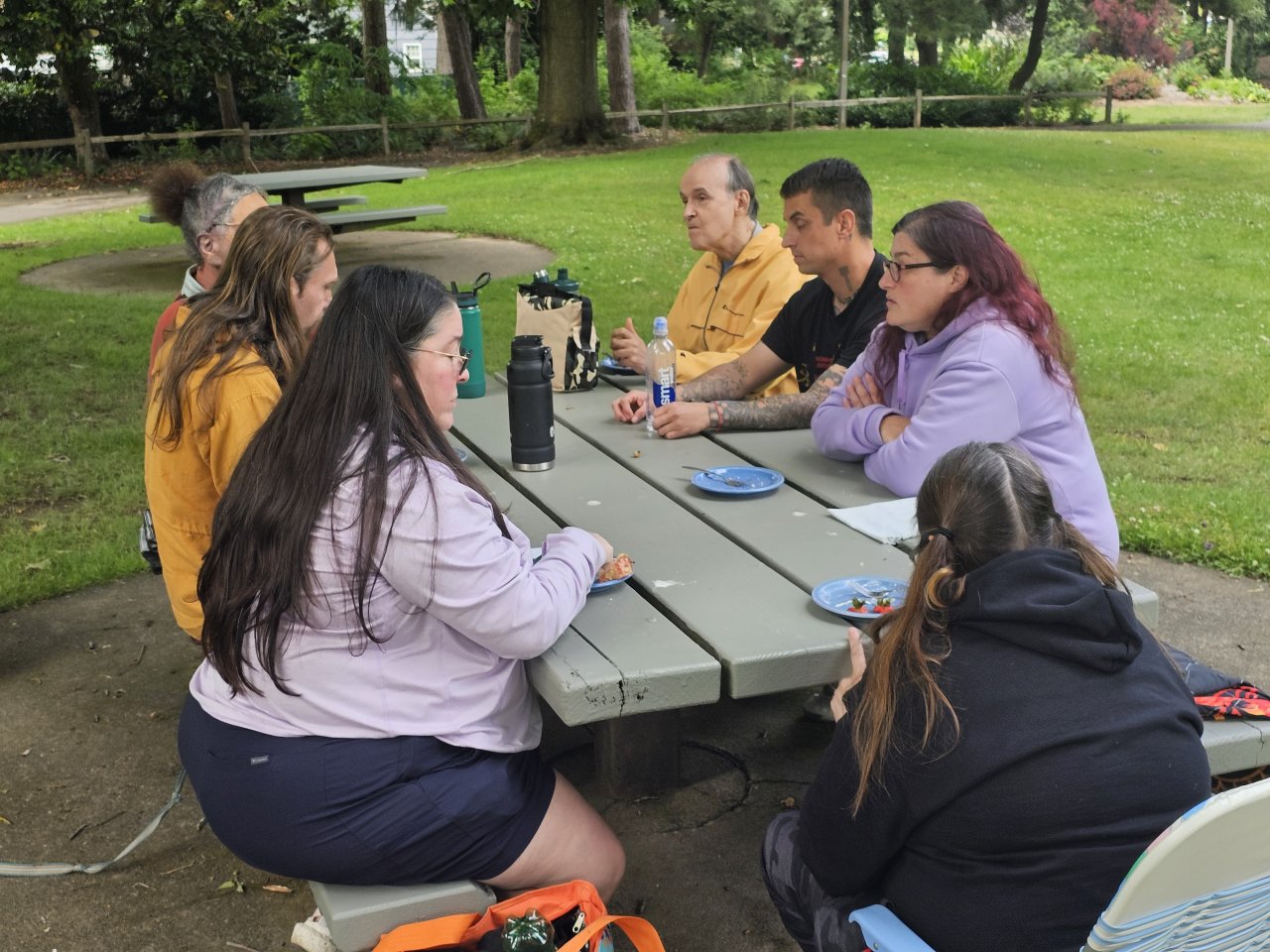 Observing Fratres and Sorores at the picnic table being photographed unknowingly for all to enjoy later.