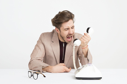 Sweating it up in his call centre, poor Nigel just wanted a single code change to stave off insanity for one more day!