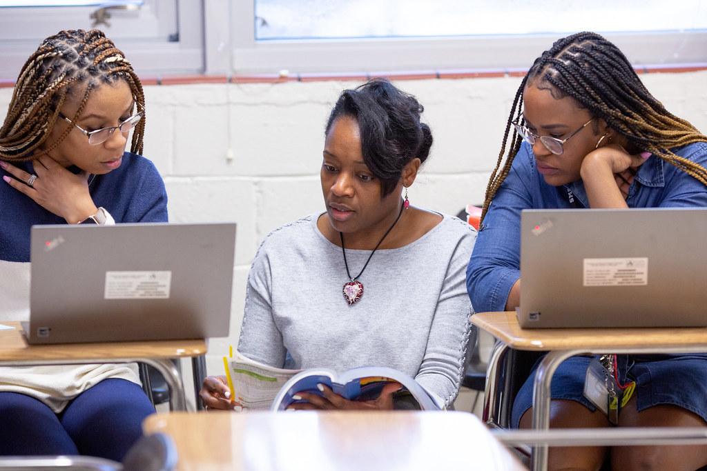 Three Black teachers collaborate