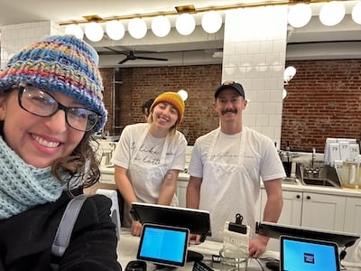 Councilmember Nadeau takes a selfie with two staff members of Tatte Bakery