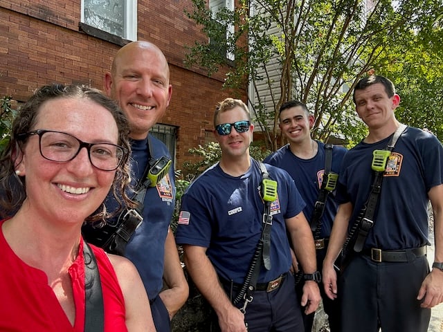 Councilmember Nadeau poses for a selfie with firefighters