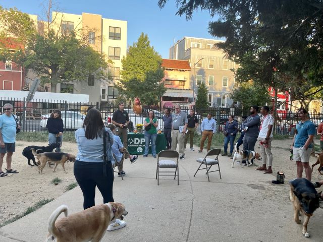 People and dogs gather at 11th and Bark location for dog park community kick off meeting