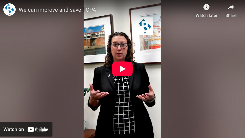 YouTube video screenshot showing Councilmember Nadeau standing and speaking while gesturing, with a play button on the screen. The title is 