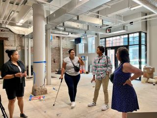 Councilmember Nadeau tours the DC Center, under construction, with center staff