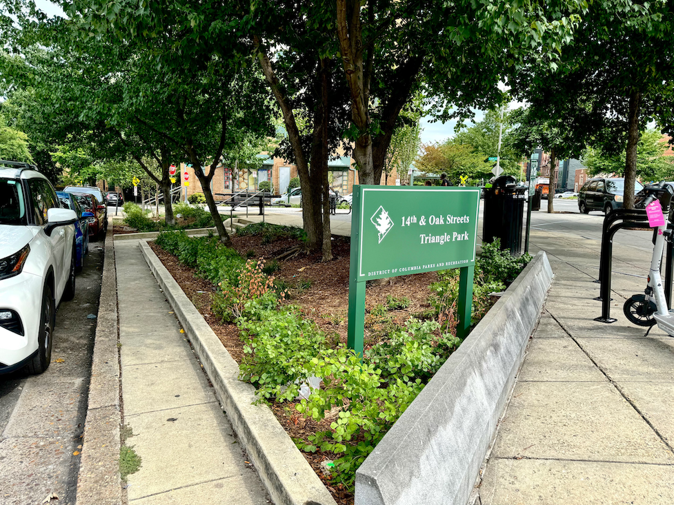A green sign reads 
