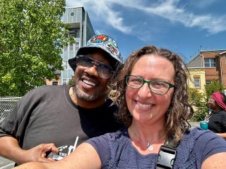 Councilmember Brianne Nadeau poses for a selfie with Pastor Hart