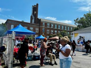 The Christian Tabernable community celebration. people walk around with tents outside