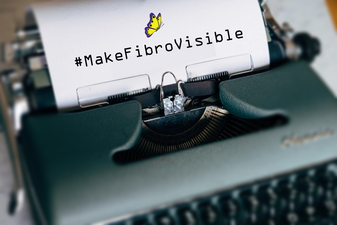 image of a typewriter with makefibrofisible typed on it and a butterfly logo
