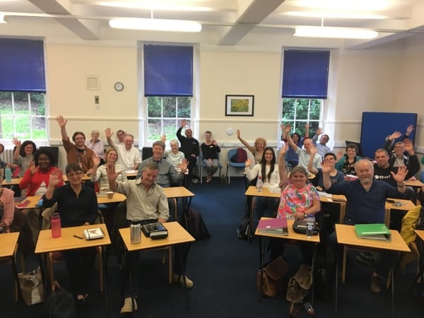 Charis Dumfries students waving